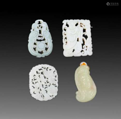 GROUP OF FOUR FINELY CARVED JADE PENDANT