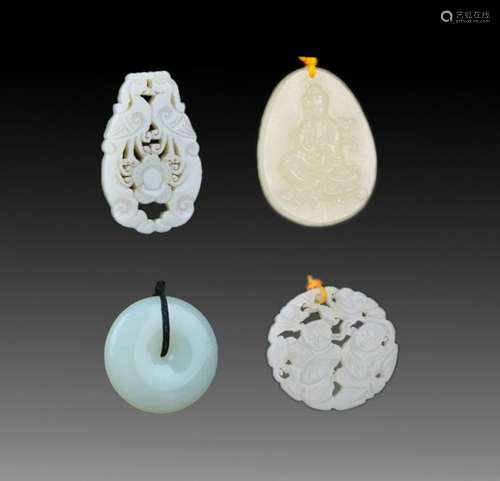 GROUP OF FOUR FINELY CARVED JADE PENDANT