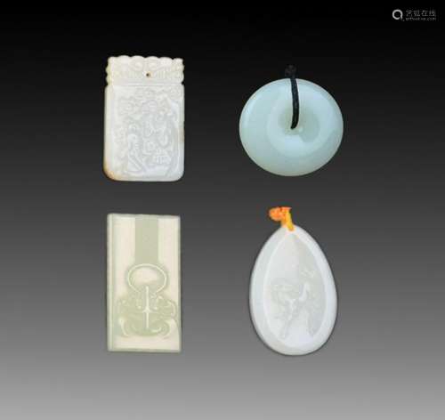 GROUP OF FOUR FINELY CARVED JADE PENDANT