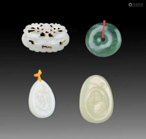 GROUP OF FOUR FINELY CARVED JADE PENDANT