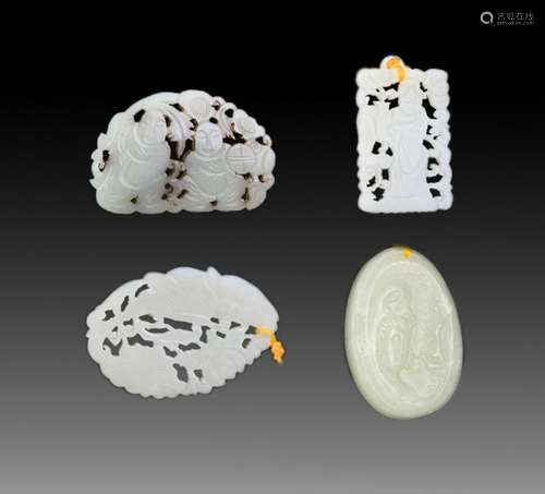 GROUP OF FOUR FINELY CARVED JADE PENDANT