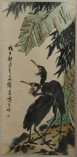 CHINESE SCROLL PAINTING OF BIRD UNDER BANANA LEAF