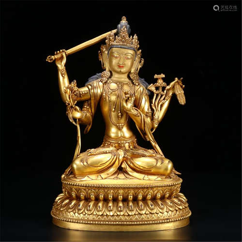 TIBETAN GILT BRONZE SEATED BUDDHA WITH SWORD