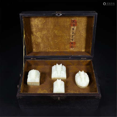 FOUR CHINESE WHITE JADE DRAGON SEALS