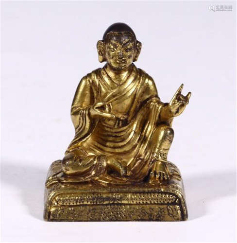 TIBETAN GILT BRONZE SEATED GURU