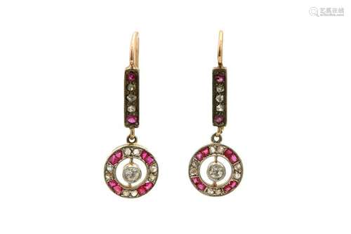 A pair of ruby and diamond earrings