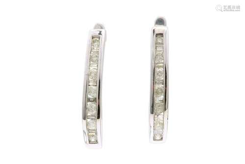 A pair of diamond earrings