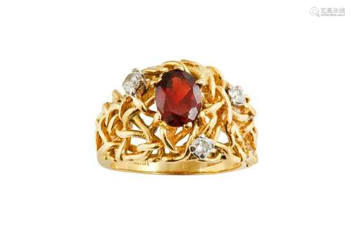 A garnet and diamond ring