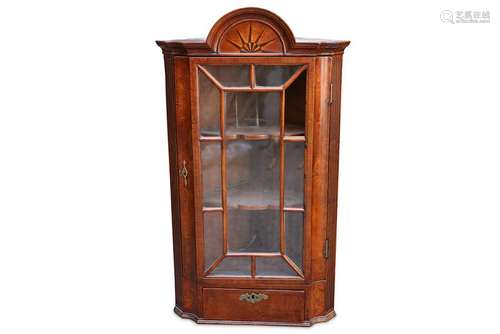 A Georgian oak hanging corner cupboard