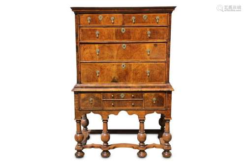 A Queen Anne and later walnut chest on stand