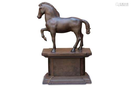 A bronzed mantle figure of a stallion