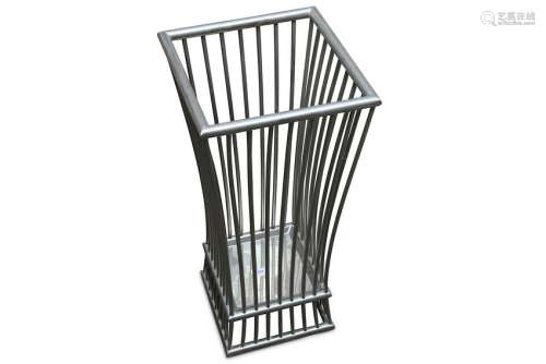 A contemporary steel basket umbrella/stick stand