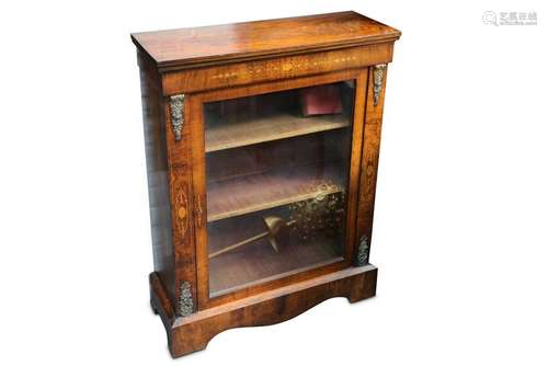 A Victorian walnut and ormolu mounted pier cabinet