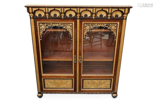 An unusual late 19th Century mahogany gilt decorated