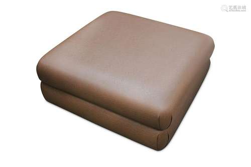 A square brown leather pouffe