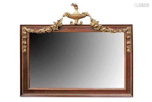 A Victorian wall mirror, with a fluted walnut and