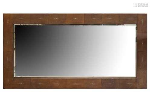 A large modern wall mirror in the manner of Andrew