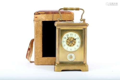 An antique brass four glass brass alarm carriage clock