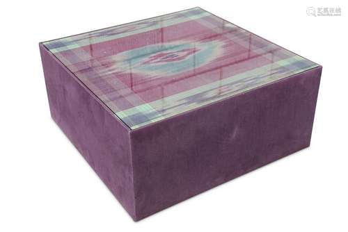 CONTEMPORARY: A Low Table, upholstered in IKAT fabric,