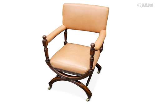 A late Victorian walnut open armchair