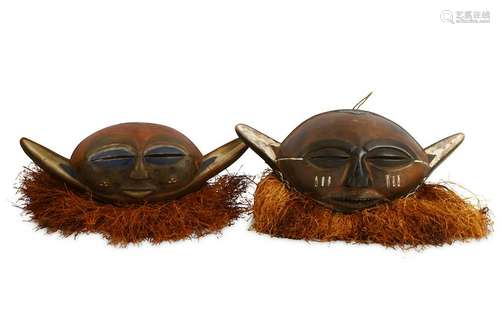 TWO EASTERN PENDE STYLE MASKS