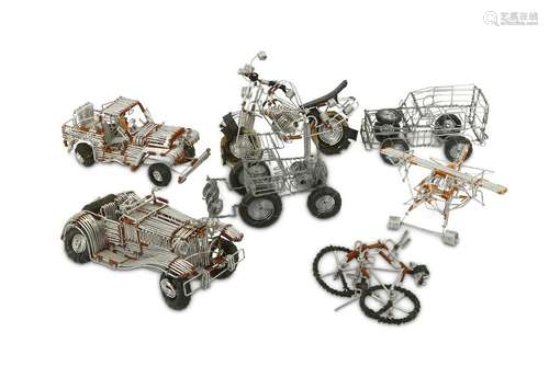 A GROUP OF METAL MODEL VEHICLES