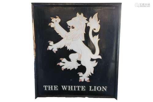 A large black painted wooden 'White Lion' pub sign