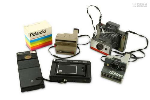 A Group of Polaroid Cameras and Accessories