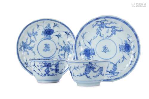 A PAIR OF CHINESE BLUE AND WHITE CUPS AND SAUCERS.