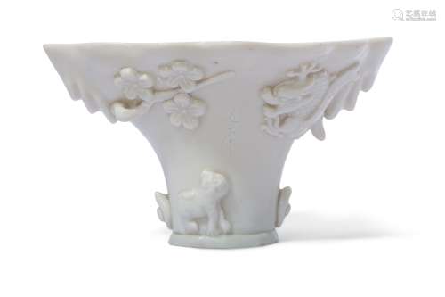 A CHINESE BLANC-DE-CHINE LIBATION CUP.