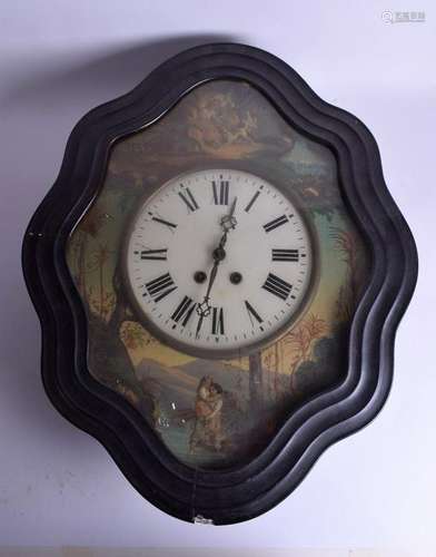 A LARGE CONTINENTAL EBONISED PAINTED DIAL WALL CLOCK.