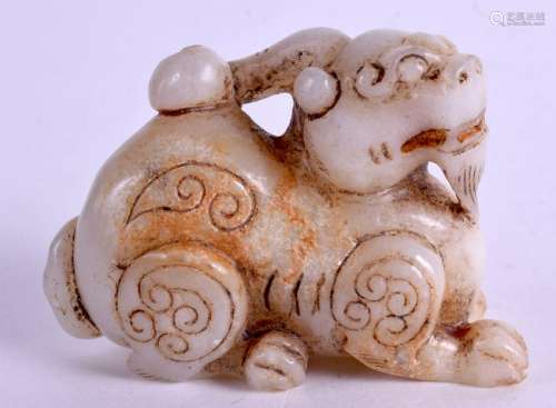 A CHINESE JADE TYPE BUDDHISTIC LION. 9 cm x 6.5 cm.