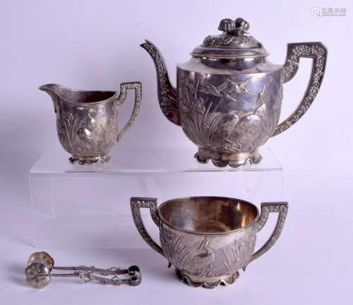 A 19TH CENTURY CHINESE FOUR PIECE SILVER TEASET by Wang