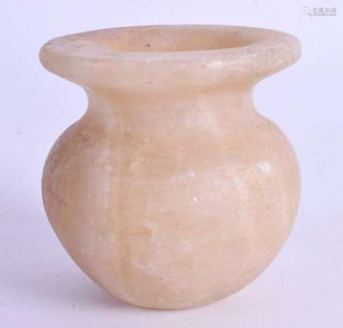 AN EGYPTIAN CARVED ALABASTER VASE. 6 cm high.