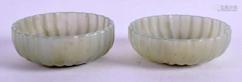 A PAIR OF 19TH CENTURY CHINESE JADE BOWLS. 6.5 cm wide.