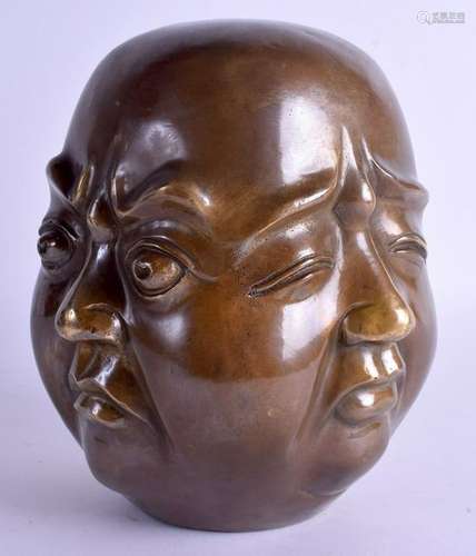 A LARGE CHINESE FOUR SIDED BRONZE HEAD. 21 cm x 10 cm.