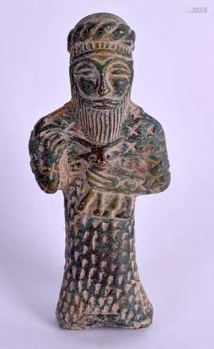 A CENTRAL ASIAN BRONZE IDOL. 9 cm high.