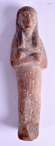 AN EGPYPTIAN CARVED USHABTI FIGURE. 18 cm high.