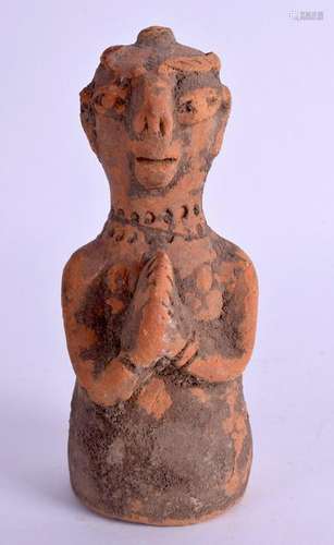 A CENTRAL ASIAN POTTERY FIGURE. 15.5 cm high.