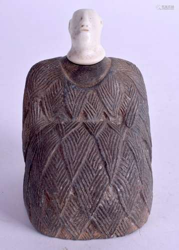 A CENTRAL ASIAN STONE IDOL. 11 cm x 5 cm.