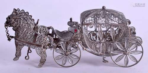 AN INDIAN WHITE METAL CARRIAGE. 70 grams. 12 cm x 5 cm.