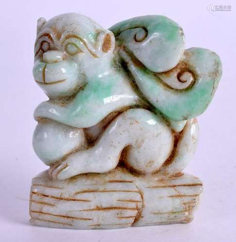 A MIDDLE EASTERN CARVED JADEITE MONKEY. 7 cm x 7 cm.