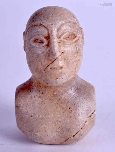 A CENTRAL ASIAN STONE IDOL. 7 cm x 4 cm.