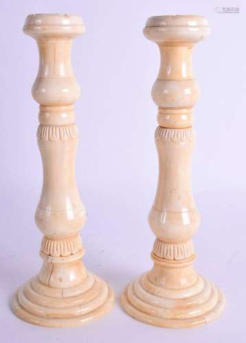 A PAIR OF CONTINENTAL BONE CANDLESTICKS. 20 cm high.