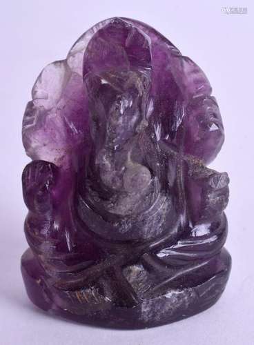 AN INDIAN CARVED AMETHYST GANESHA. 5 cm x 3.5 cm.