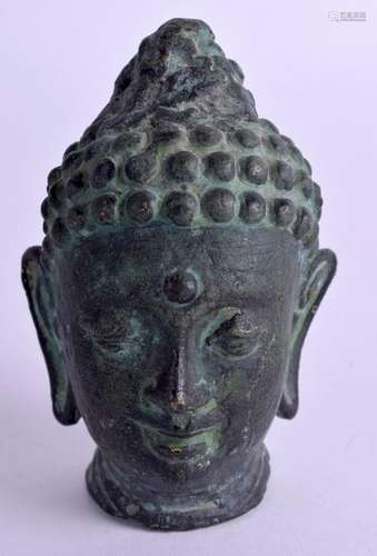 AN ASIAN BRONZE BUDDHA HEAD. 7.5 cm x 4 cm.