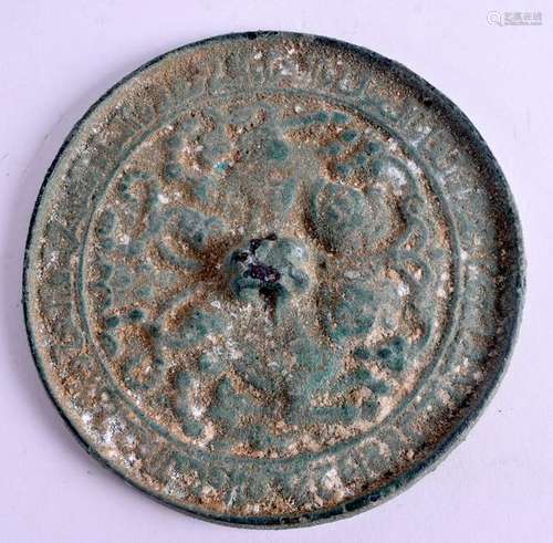 A CHINESE BRONZE HAND MIRROR. 10.5 cm wide.