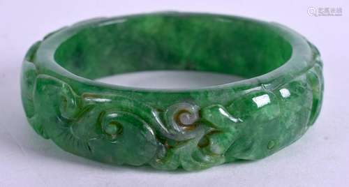 A CHINESE JADE BANGLE. 7.5 cm wide.