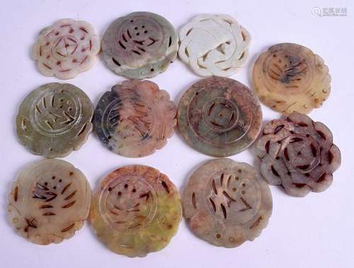 ELEVEN CHINESE JADE AND HARDSTONE DISCS. (11)