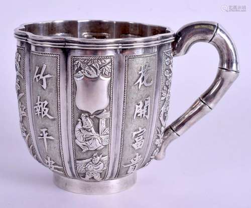 A 19TH CENTURY CHINESE EXPORT SILVER SCALLOPED MUG by